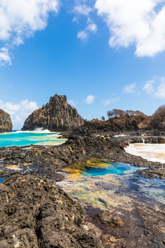 View of one of the stunning natural pools in Baia dos Porcos in Fernando de Noronha, Brazil