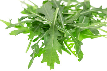 fresh arugula leaves on a white background