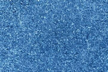 Texture of small stones of different shades of blue