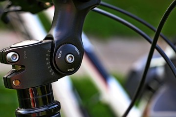 Bicycle FORK STEERING COLUMN . Marking  scale on the  Adjustable Bicycle Stem , selective focus