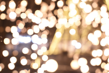 Obraz premium shiny light from electric bulb in the dark night, bokeh background