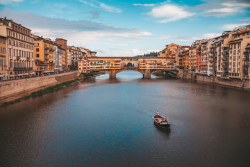 Fototapeta premium River Arno with Ponte Vecchio in Florence, Italy