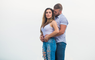 Naklejka premium Couple in love. Supporting her. Family love. Devotion and trust. Together forever we two. Love story. Romantic relations. True love. Cute relationship. Man and woman cuddle nature background