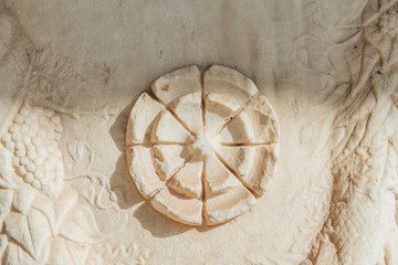 Rosette Flower Carved from the stone