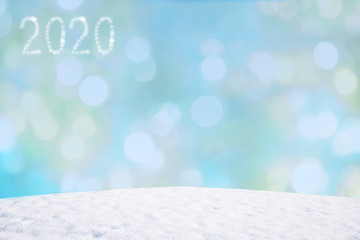 wintry background with flares and snowy hill, space for text