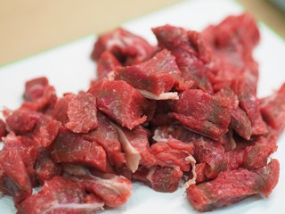 Raw meat, cut into pieces, raw beef