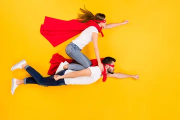 Foto op Canvas Top view above high angle flat lay flatlay lie view concept of her she his he focused strong successful people flying to goal isolated on bright vivid shine vibrant yellow color background © deagreez