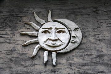 Traditional stone carvings of mountain tribes in Taiwan carved with sun and moon material elements