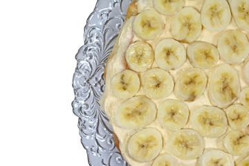 Banana and cream pie. Banana cake, top view.
