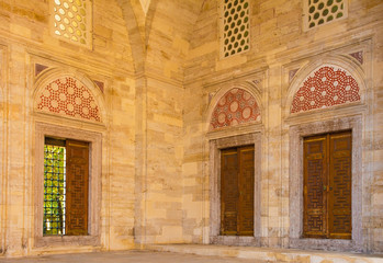 Doors in the courtyard portico of Sehzade Mosque in the Fatih district of Istanbul. This 16th century Ottoman imperial mosque is also known as the Prince's Mosque