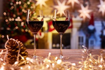 Christmas still life with glasses of red wine