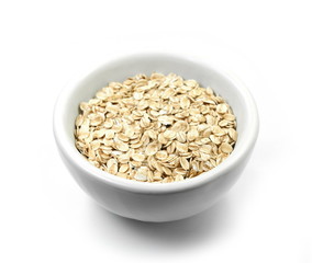 Rye oat flakes isolated on white , macro close up