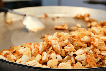 Stir fried squid eggs on flat pan