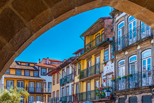 Facades of houses at Largo da Oliveria in the old town of Guimaraes, Portugal