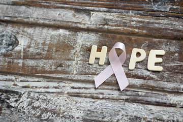 Pink ribbon. Symbol of breast cancer awareness. Health care conception. Preventive measures. October checking time. Women health. Text space. 
