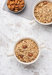 Granola, oatmeal with almond food background
