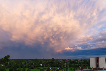 Fototapeta premium Big and thick clouds on the horizon. Blue sky with thick clouds. Soft focus