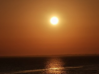 Fototapeta na wymiar Sonnenuntergang Meer Strand Küste 