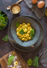 Plate of tortellinis with ricotta and spinach.