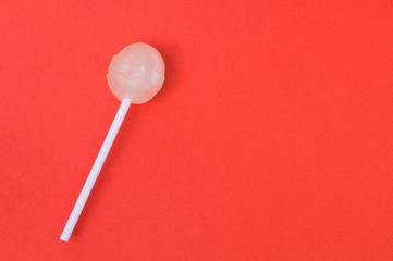 Lollipop on red background, mock up, copy space, text space