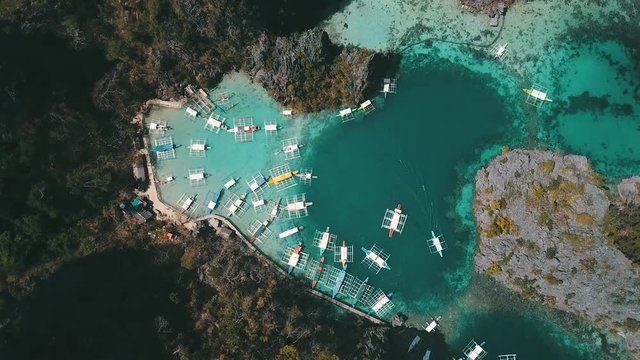 birds eye view of a Philippine boat going out fo the dock