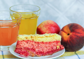 Homemade fresh cake with raspberry fillet, fruit and juices