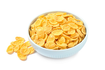 Bowl of tasty corn flakes on white background
