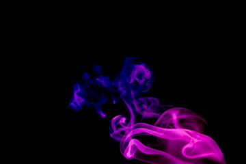 multicolored smoke photo aginst balck background