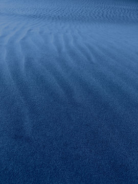 Desert Sand Dune Blue Closeup Background.