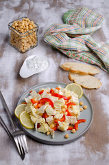 Raw vegetables and chickpeas salad