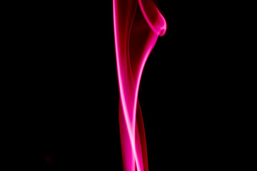 single colored smoke aginst black background