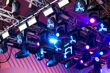 Set of professional stage lighting equipment for gig illumination.Floodlights,several powerful ...