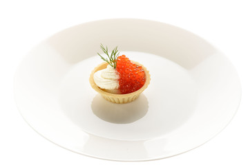 red caviar in a basket of dough with cream cheese on a white plate