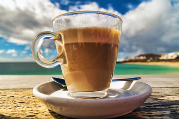 Cup of Coffee on Wooden Table