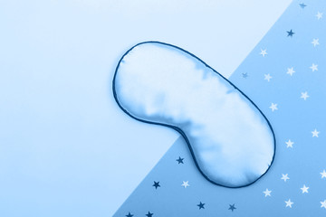Sleeping mask and confetti in trendy blue toning. Main color trend for 2020 year.