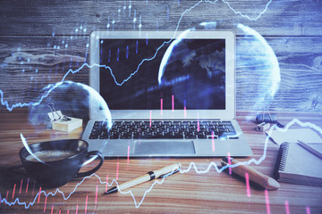 Multi exposure of graph and financial info and work space with computer background. Concept of international online trading.