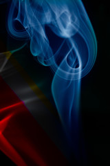 multicolored smoke photo against black background