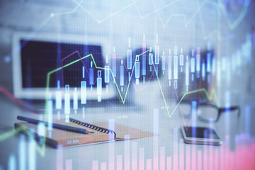 Forex Chart hologram on table with computer background. Multi exposure. Concept of financial markets.