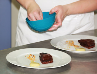 Confectioner served cake with  decoration