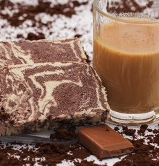 The close up of Greek halvah vanilla-cocoa with chocolate and ca