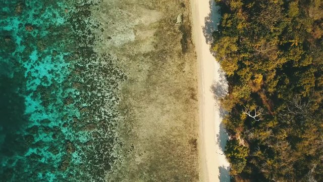 following a coastline looking at it direkt down from above.