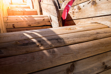 Large wooden cable reels, stored in a factory of electric cables.