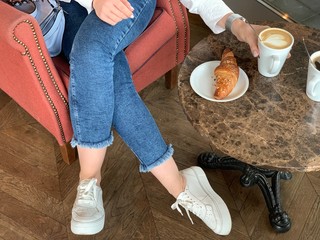 woman in a cafe with coffee