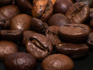 Close-up of roasted coffee beans. Macro photo coffee beans