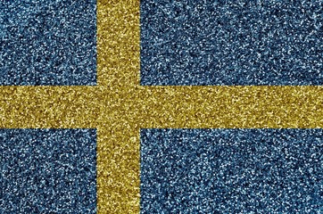 Sweden flag depicted on many small shiny sequins. Colorful festival background for party