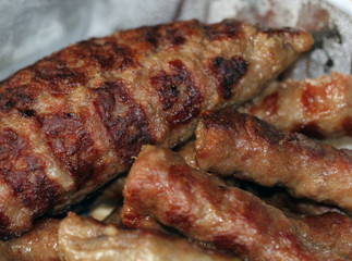 The close up of grilled Stuffed hamburger with kebabs.