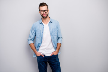 Photo of amazing macho guy perfect appearance neat hairstyle bristle young promoted boss chief easy-going person wear casual denim outfit isolated grey color background - Powered by Adobe