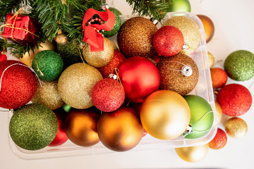 Christmas balls in a plastic transparent boxes ready to decorate a Christmas tree