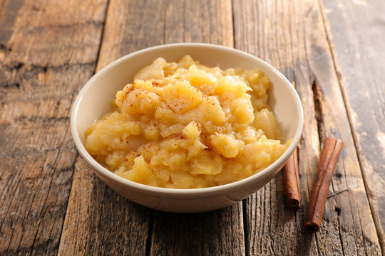 apple sauce, compote with cinnamon in bowl