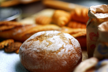 bakery concept with homemade bread. blurred background.	